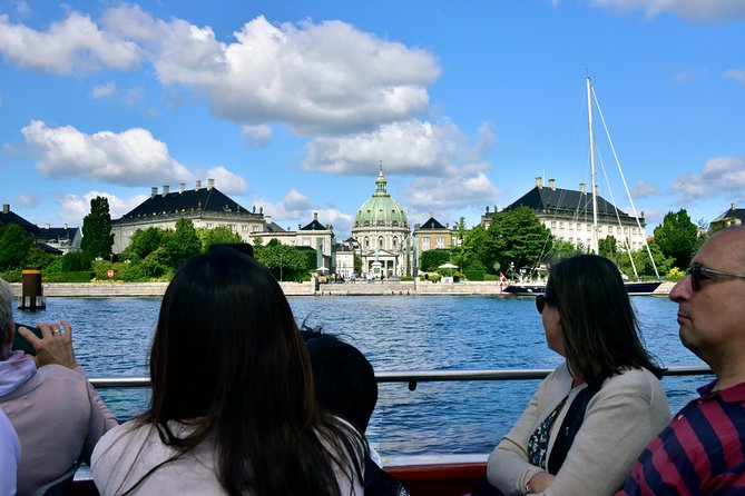 Copenhagen Sightseeing Classic Canal Tour With Live Guide - What the boat ride feels like, especially when the weather is cold