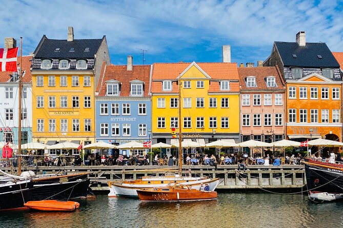Private Copenhagen Boat cruise in Scandinavian mahogany boat - Christianshavns Kanal: houseboats, bars, and a local feel