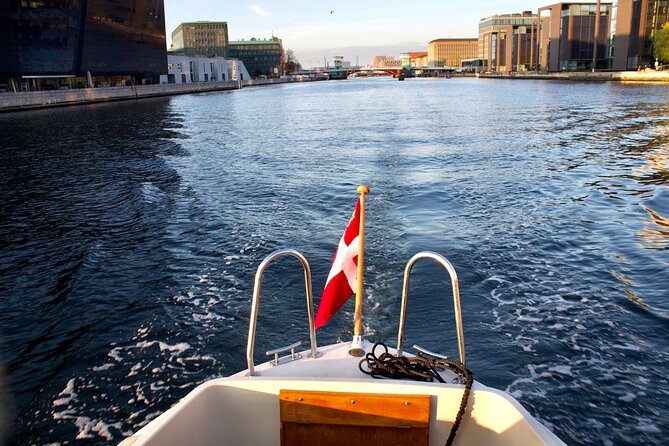 Private Copenhagen Boat Tour: Landmarks and Hidden Gems - Parliament views, Holmens Church, and the fire story you won’t forget