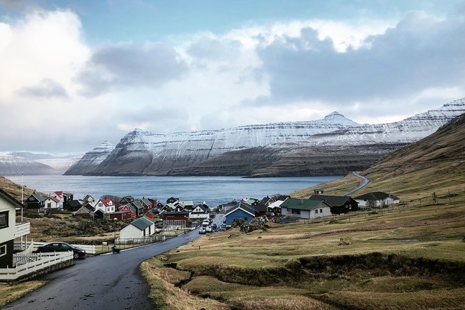 Waterfall Tour in Faroe Islands - Stop 1: Gasadalur Tunnel and the Múlafossur Waterfall Moment